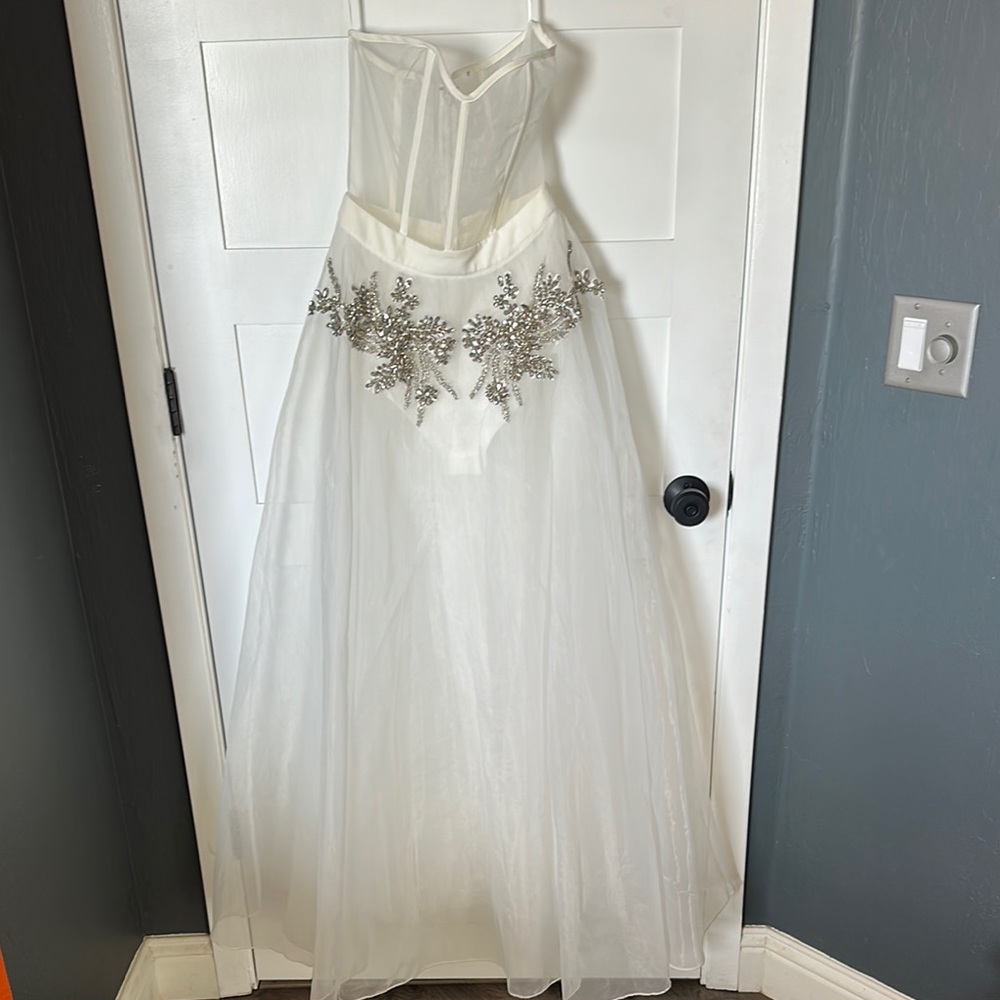 Elegant White Gown with Silver Embellishments